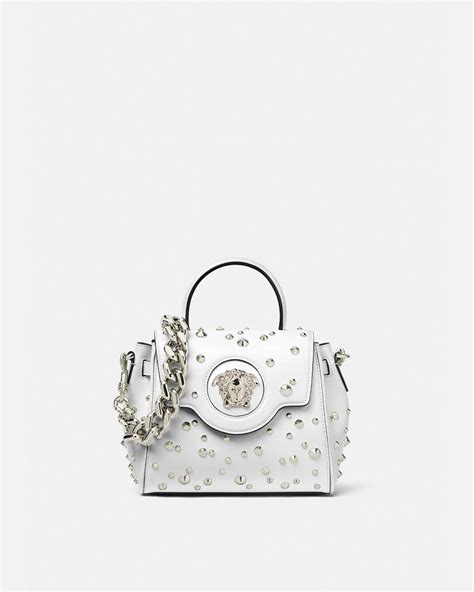 giubotto pelle versace borchie meduse|Versace La Medusa Collection .